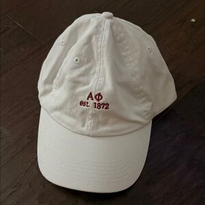 White Baseball Cap with Red Alpha Phi Embroidery